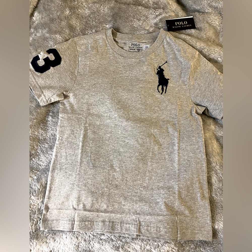 Polo by Ralph Lauren has a gray T-shirt.